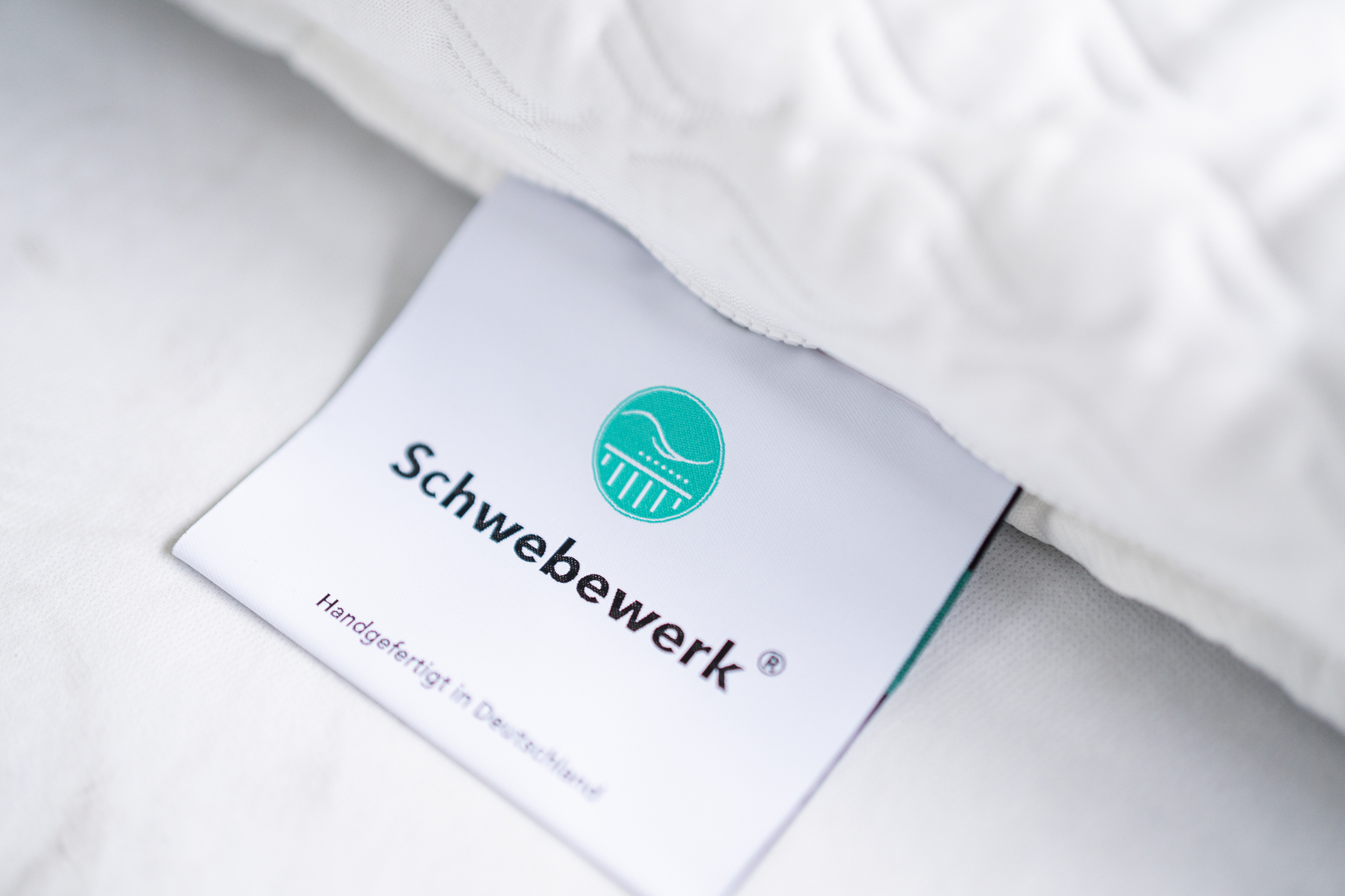 Stoffzunge an Schwebewerk Matratze